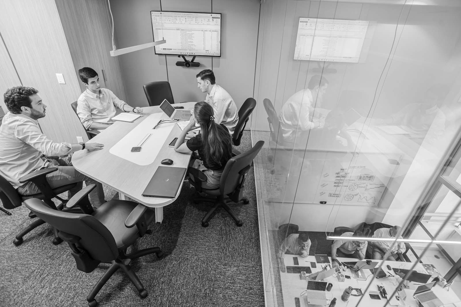 Executive team meeting in a modern conference room